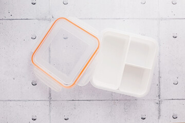 Empty white plastic food container