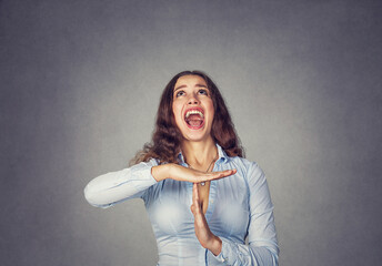 Woman showing time out hand gesture, screaming to stop it - obrazy, fototapety, plakaty