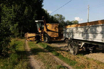Fototapeta premium Wilamowice,Poland - July 15, 2020 : Harvest in Poland. Bizon ZO56 harvester
