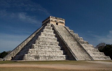 Fototapeta na wymiar Tourism. Seven world wonders. Ancient maya civilization and architecture. Temple Kukulkan of Chichen Itza, mayan stone pyramid ruins in Yucatan, Mexico.