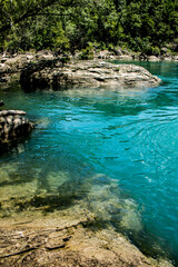 turquoise water in a tropical forest