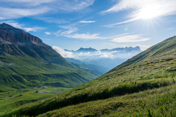 Naklejka premium Colorful summer scene in southern slope of Piz Boe mountain range. Sunrise in Dolomite Alps, view from Pordoi pass, Canazei location, Trentino, Italy, Europe.