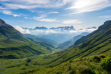 Panorama of the Piz Boe mountain range at sunny foggy morning. View from Pordoi pass. Dolomites mountains, Italy, Europe.