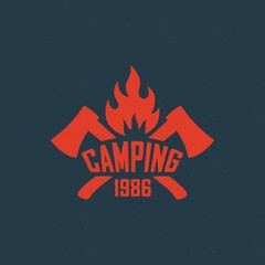 Colored text illustration, crossed axes, fire on a blue background. Vector illustration of a camping logo in vintage style with a grunge texture. Wildlife travel illustration.