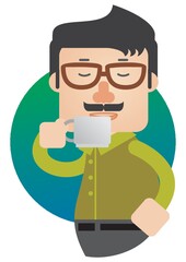 man drinking a cup of coffee