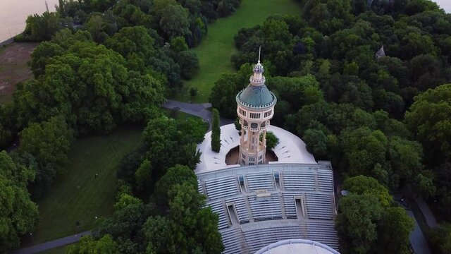 Aerial top down shot of famous water tower and outdoor stage theater on margaret island in Budapest