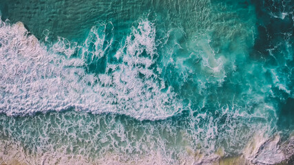 Coast as a background, aerial top view. Turquoise water background from top view. Summer seascape from air