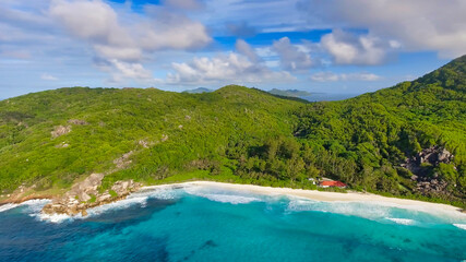 Fototapeta na wymiar Aerial view of tropical island with sea, vegetation and shoreline