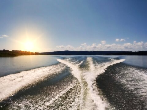 Sol encanta as aguas