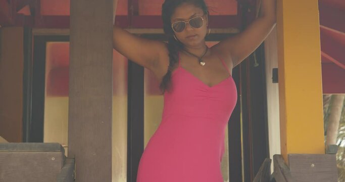 A model actor pretending to be lifeguard at this beachfront Caribbean destination