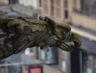 Close up of beaked gargoyle on a building in Edinburgh, Scotland, UK