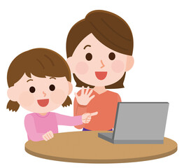 パソコンを一緒に見る女の子と母親