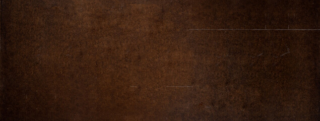 Textured banner  of weathered cardboard material, grunge background 