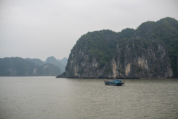 Fototapeta na wymiar Boat on water at Halong Bay in Vietnam