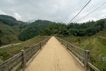 Fototapeta na wymiar Dirt road in Mường Hoa Valley near Sapa in Vietnam