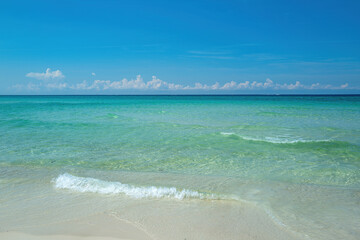 Beautiful seascape panorama. Sea beach with blue sky sand sun.