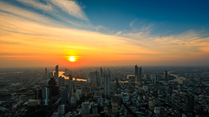 Aerial view of Bangkok City skyscrapers and blue sky the sunset background with King Power MahaNakhon viewpoint