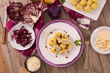 Potato gnocchi stuffed with radicchio and ricotta.	