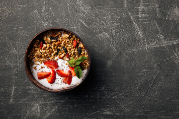 Healthy breakfast granola yogurt and strawberries