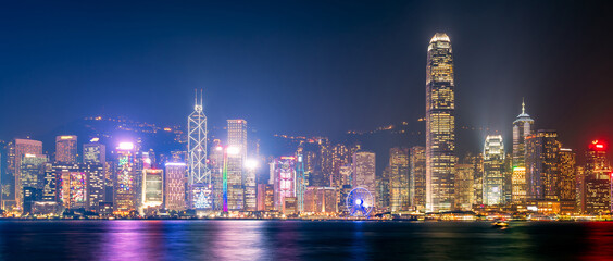 Fototapeta na wymiar Panorama view of Hong kong downtown the famous cityscape view of Hong Kong skyline during twilight time from Kowloon side at Hong Kong.