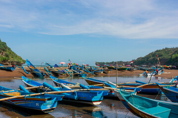 Fototapeta na wymiar boats on the beach color full