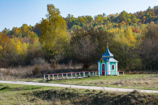 Little chapel by the autumn forest