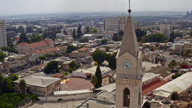 Big Franciscan church in the city center of Ramleh, Israel, aerial drone view 4k