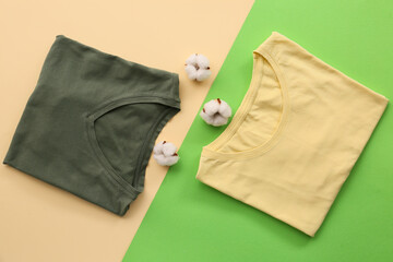 Cotton t-shirts on color background