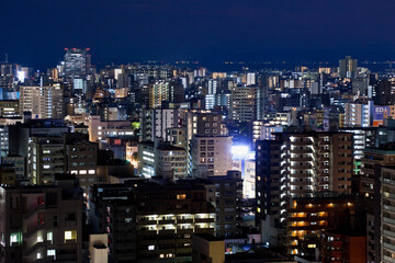 Fototapeta na wymiar 城山より見る鹿児島市街地の夜景と桜島 