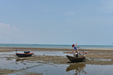 fishing boats on the beach in thailand