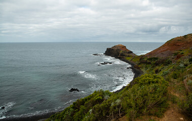 Fototapeta na wymiar Rocks and sea on the coast of Cape Schanck at Mornington Peninsula in Victoria, Australia