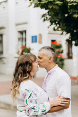 Fototapeta premium Happy portrait of loving couple on a walk in the park on a sunny day