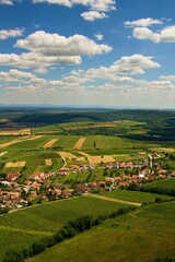 Fototapeta premium The colorful wine village Pavlov on the background of traditional landscape of region of Moravia (Morava), Czechia, middle/central Europe