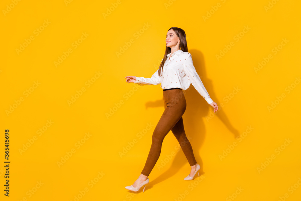 Sticker Full size profile side photo of positive candid cute sweet girl go walk want meet work colleagues friends wear stylish clothes shoes isolated shine color background