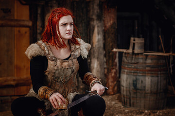 Viking girl. Reconstruction of a medieval scene