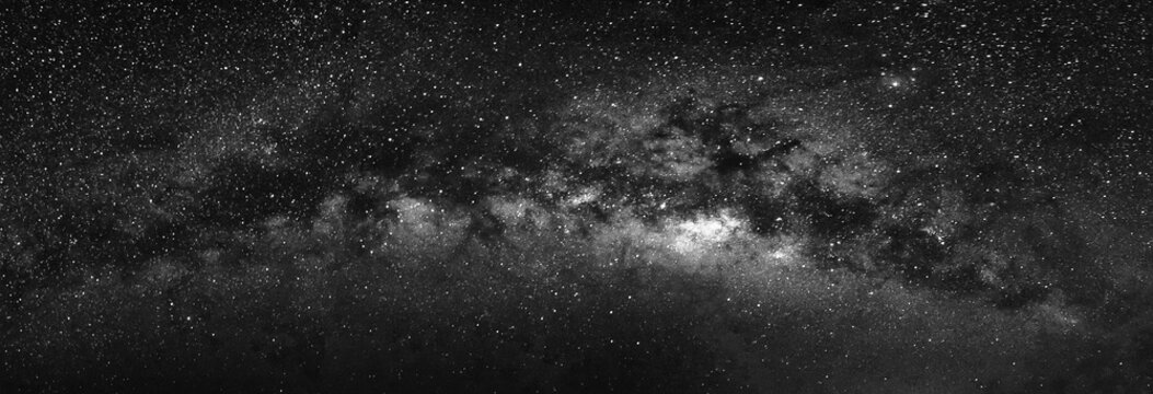 Fototapeta Nature view of milky way galaxy with star in universe space at night.