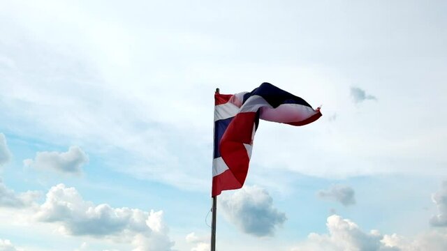 Image of waving Thai flag of Thailand, The national flag fluttering in the wind red white and blue