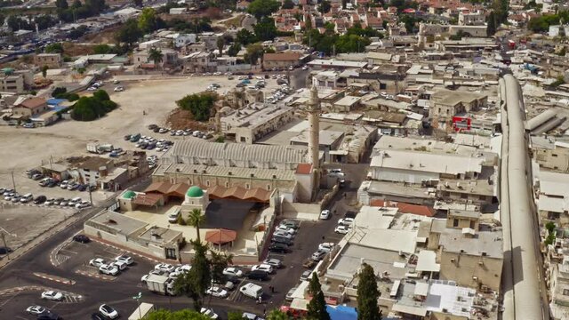 Big mosque in the city center of Ramleh, Israel, aerial drone view 4k