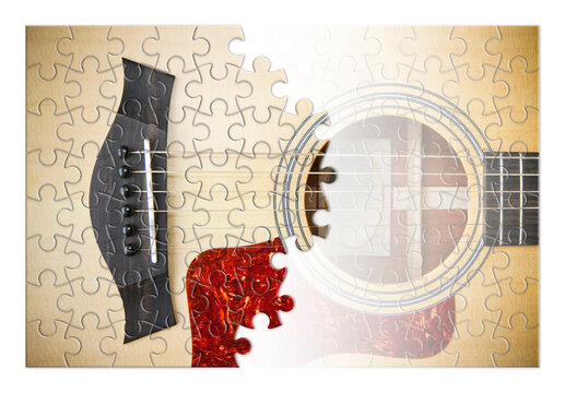 Patience and passion to learn to play the guitar step by step - concept image in jigsaw puzzle shape