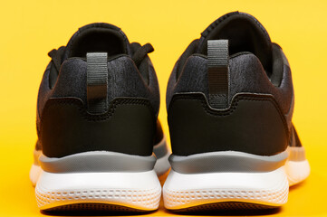 Back view of black sport shoes