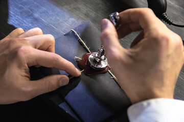 man seals an important letter with hot sealing wax
