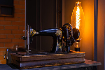 old-fashioned sewing machine and an unusual lamp in a fashion showroom