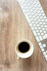 A computer and a cup of coffee. Work, business, telework, job, etc.  パソコンと飲みかけのコーヒー、仕事、ビジネス、テレワーク、ジョブなど