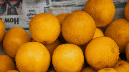 Group of Orange fruits for sale in the market