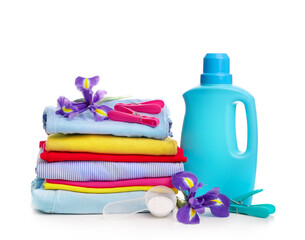 Detergent with washing powder and towels isolated on white