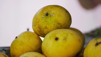 Group of yellow fresh ripe mango in fruit market