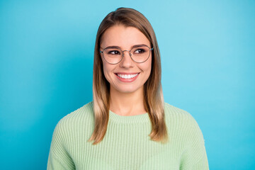 Close-up portrait of her she nice-looking attractive lovely pretty intelligent cheerful cheery content girl creating new idea isolated over bright vivid shine vibrant blue green color background