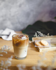 Iced coffee with milk on wooden table.coffee latte