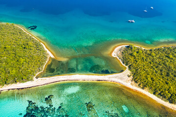 Beautiful exotic islands with natural bridge in turquoise sea on the island of Dugi Otok in Croatia, drone aerial view