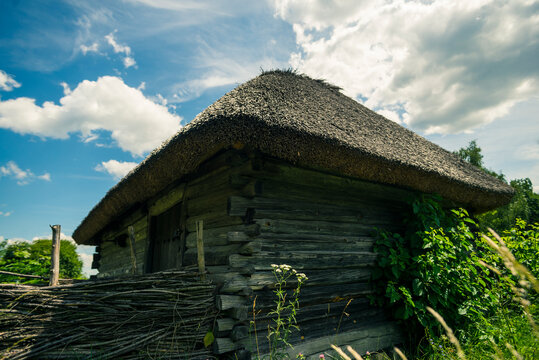 Traditional Ukrainian country house in the summer afternoon